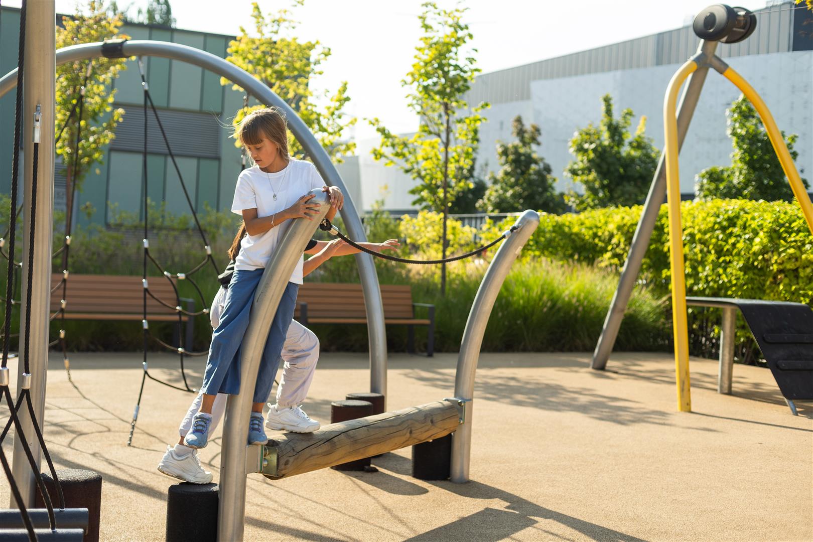 a-schoolgirl-plays-on-the-playground-in-the-city-s-2025-01-09-01-05-55-utc