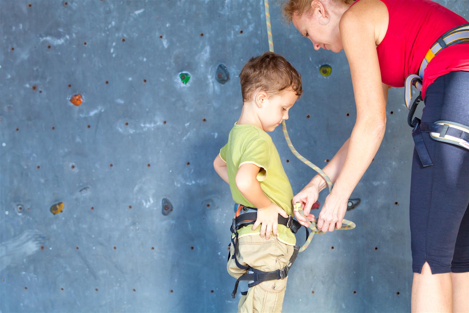 little-boy-climbing-a-rock-wall-2024-09-23-00-09-55-utc