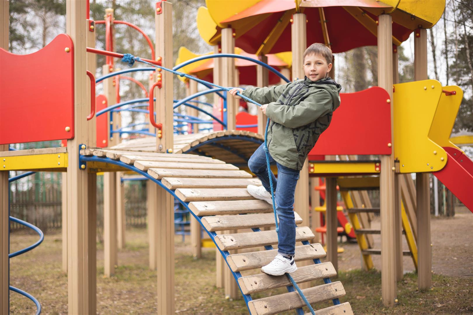 happy-teenager-boy-playing-on-kids-playground-out-2026-01-05-05-40-00-utc
